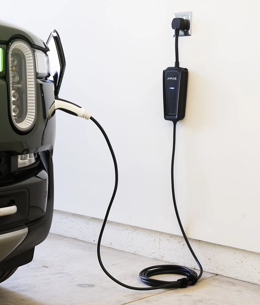 Ampure Go charger effortlessly charging an electric vehicle in garage