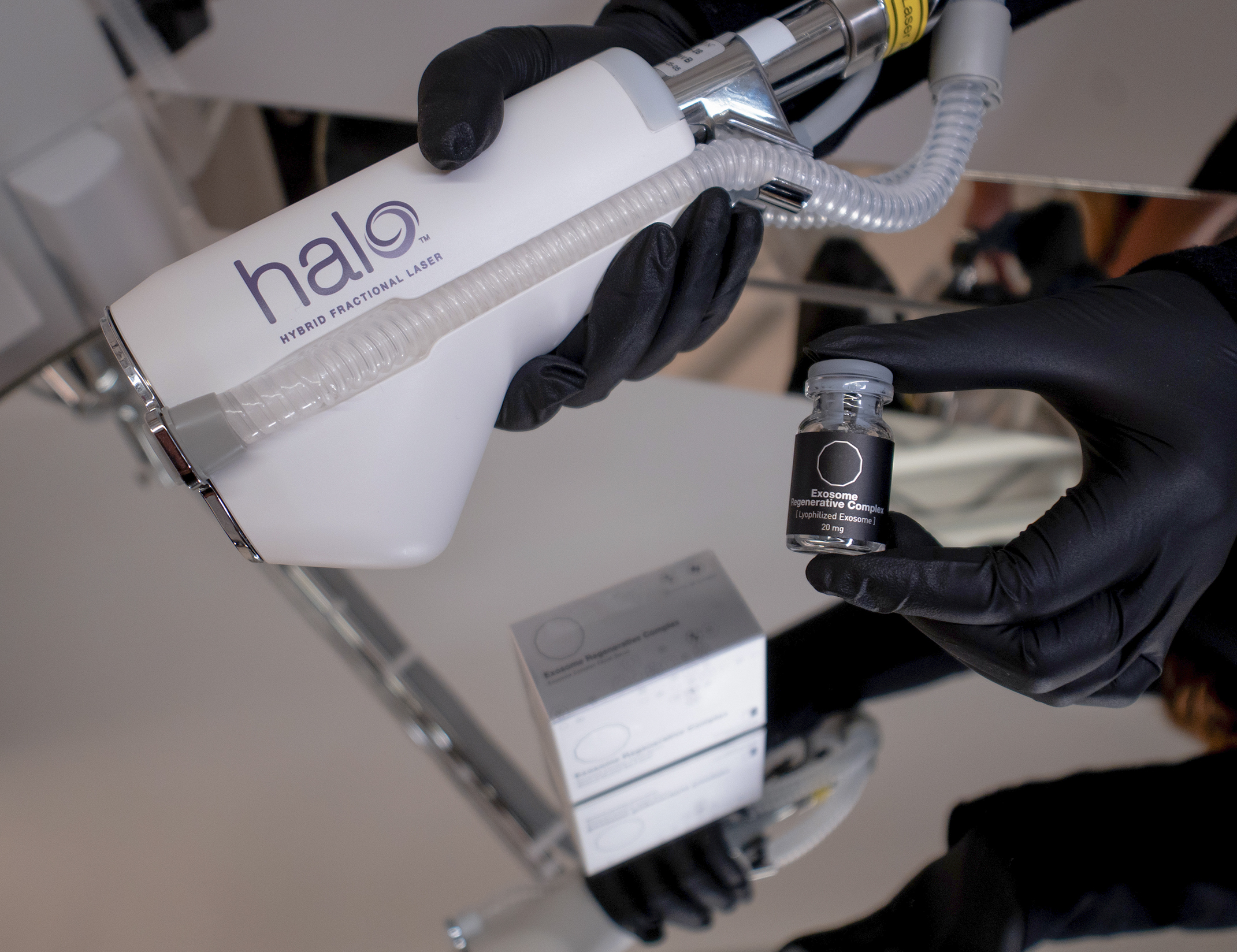 Practitioner showing off the HALO laser skin resurfacing device in San Diego