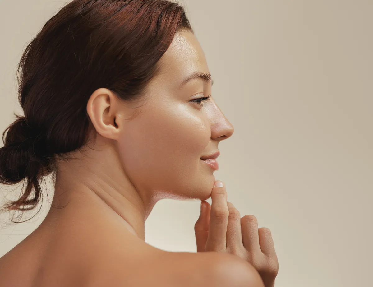 Profile of young woman with glowing skin in San Diego