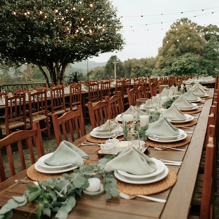 Photo of wedding reception tables and chairs set for numerous guests