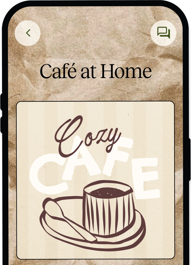 Mobile screen showing a cozy café theme with a stylized cup of coffee on a saucer with a spoon, titled 'Café at Home'.
