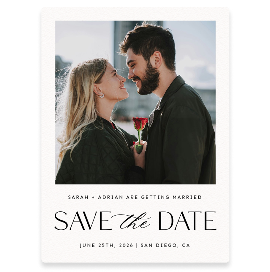 Save the date wedding announcement featuring a smiling couple facing each other closely, the woman holding a single red rose, with text announcing Sarah and Adrian are getting married on June 25th, 2026, in San Diego, CA.