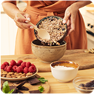 Close up of woman preparing oats