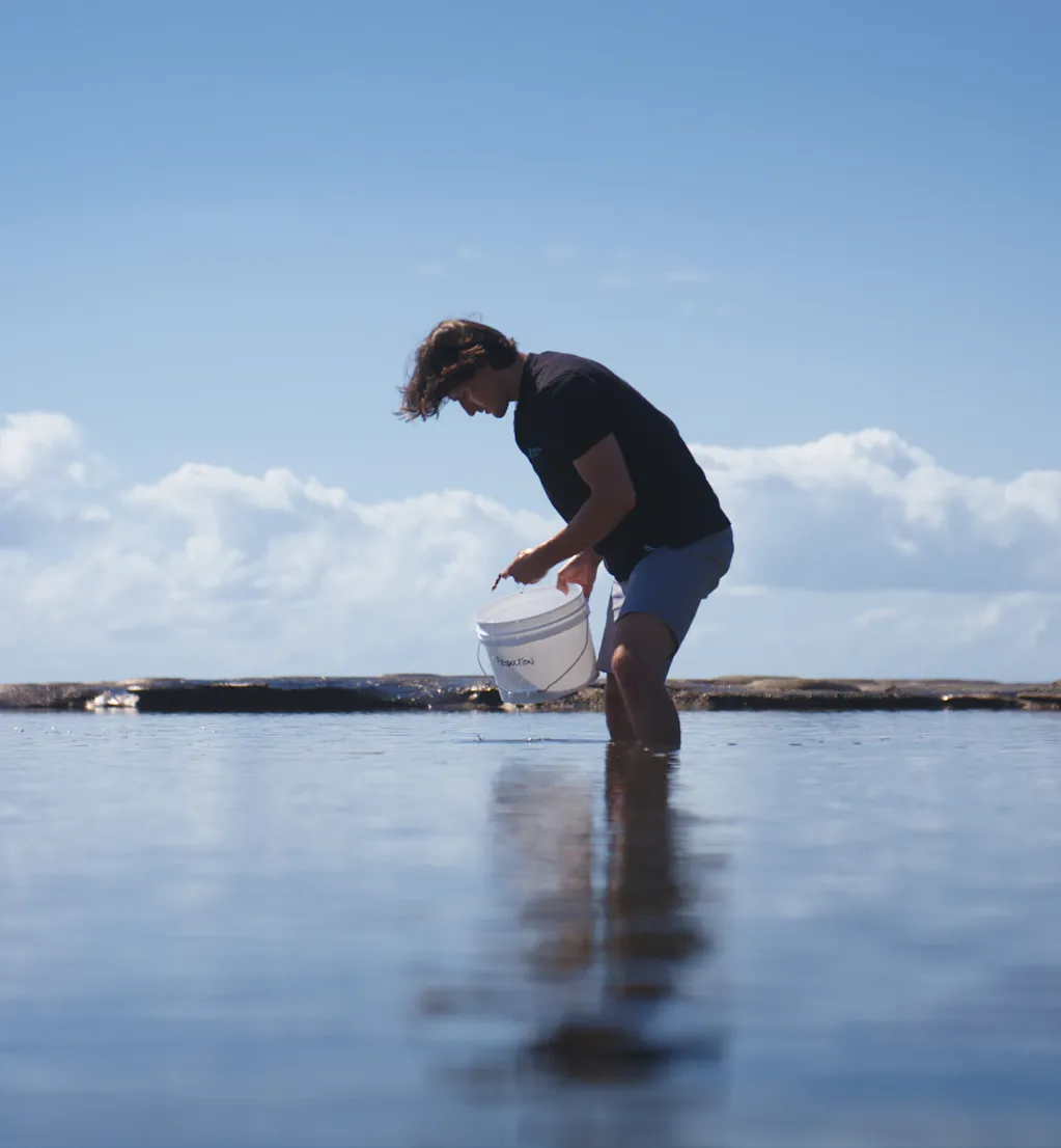 Man in rock pool
