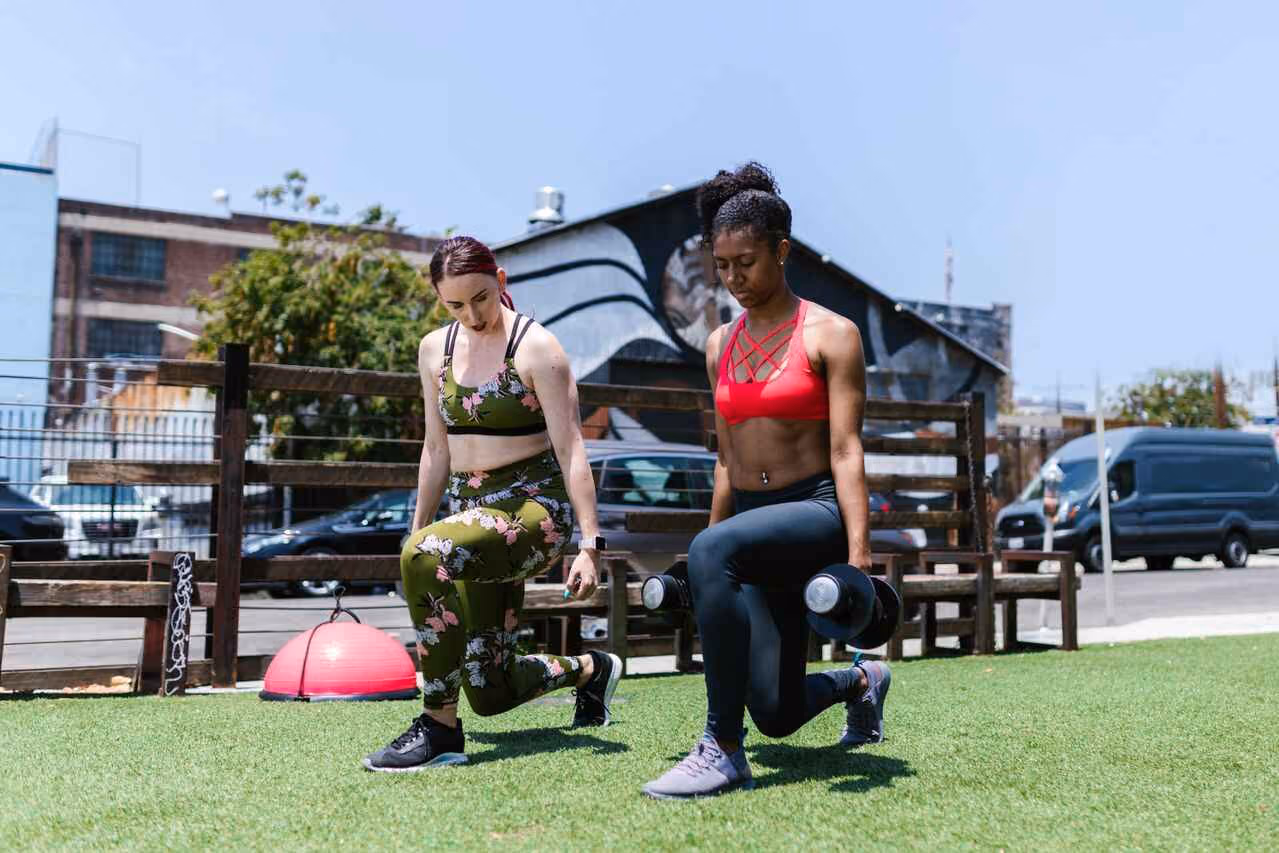 Outdoor strength training session highlighting exercise and healthy routines that support sustainable weight loss.