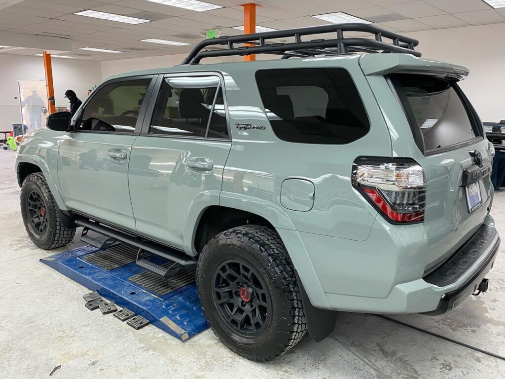 Toyota 4Runner front end protected with clear bra, full body paint corrected and polished. 7 year ceramic coating and ceramic front windows to top it off!