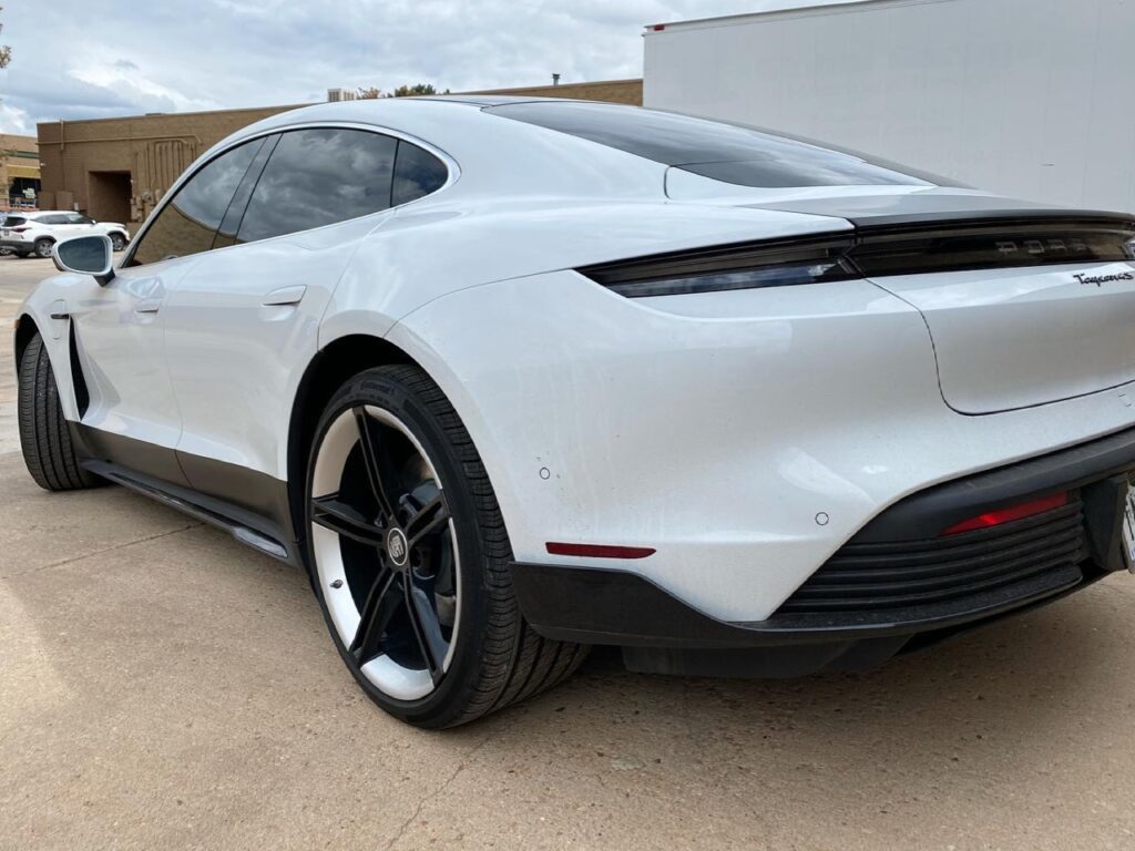Porsche Taycan satin black vinyl wraps accents side view
