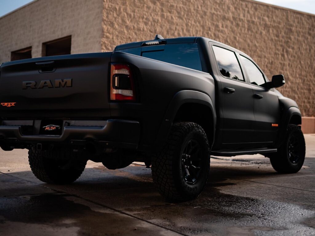 RAM TRX matte black with matte orange emblems vinyl wraps