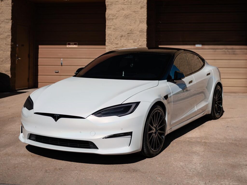 Tesla Model S Plaid gloss flip ghost pearl vinyl wrap, headlight/ taillight tint, gloss black pillars, ceramic coating, window tint