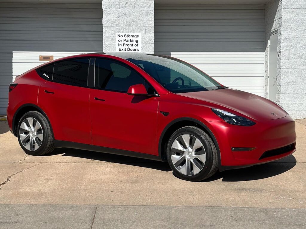 Tesla Model Y all wrapped up in Satin Vampire Red