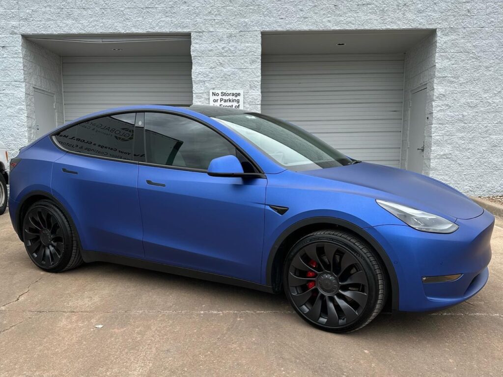 Tesla Model Y all wrapped up in Matte Slate Blue