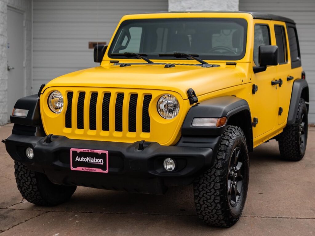 Jeep Wrangler Satin Yellow vinyl wrap with two layers of ceramic coating