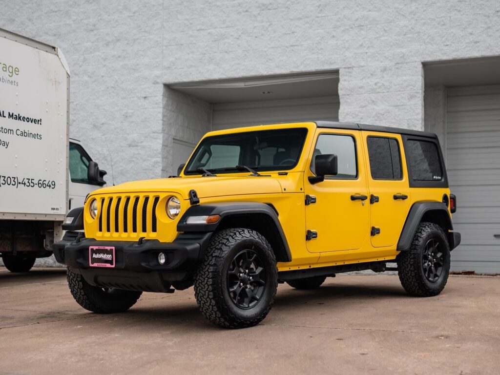 Jeep Wrangler Satin Yellow vinyl wrap with two layers of ceramic coating