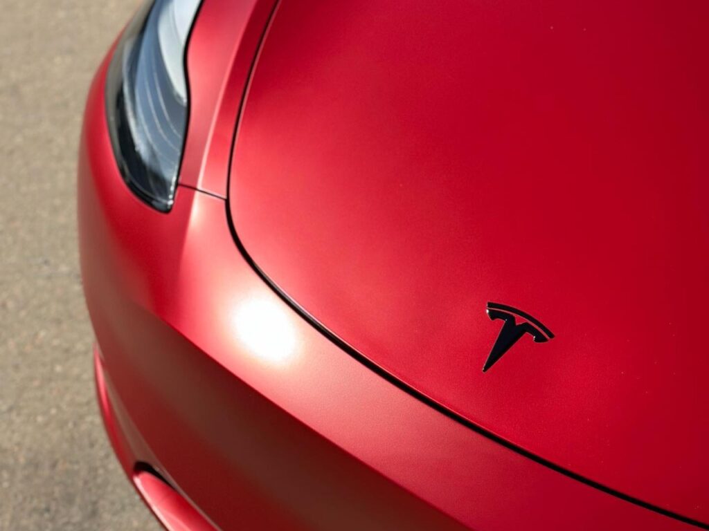 Tesla Model Y front wrapped up in Satin Vampire Red