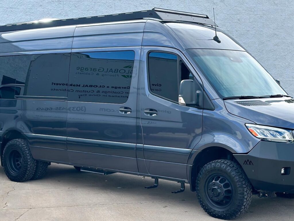 Customized Mercedes Sprinter van in South Denver showcasing ceramic coating and tinted windows