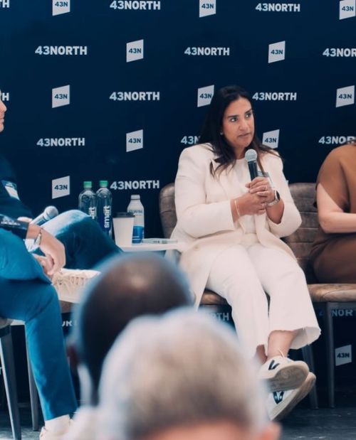 Group of people sitting at table, Hearst Tower