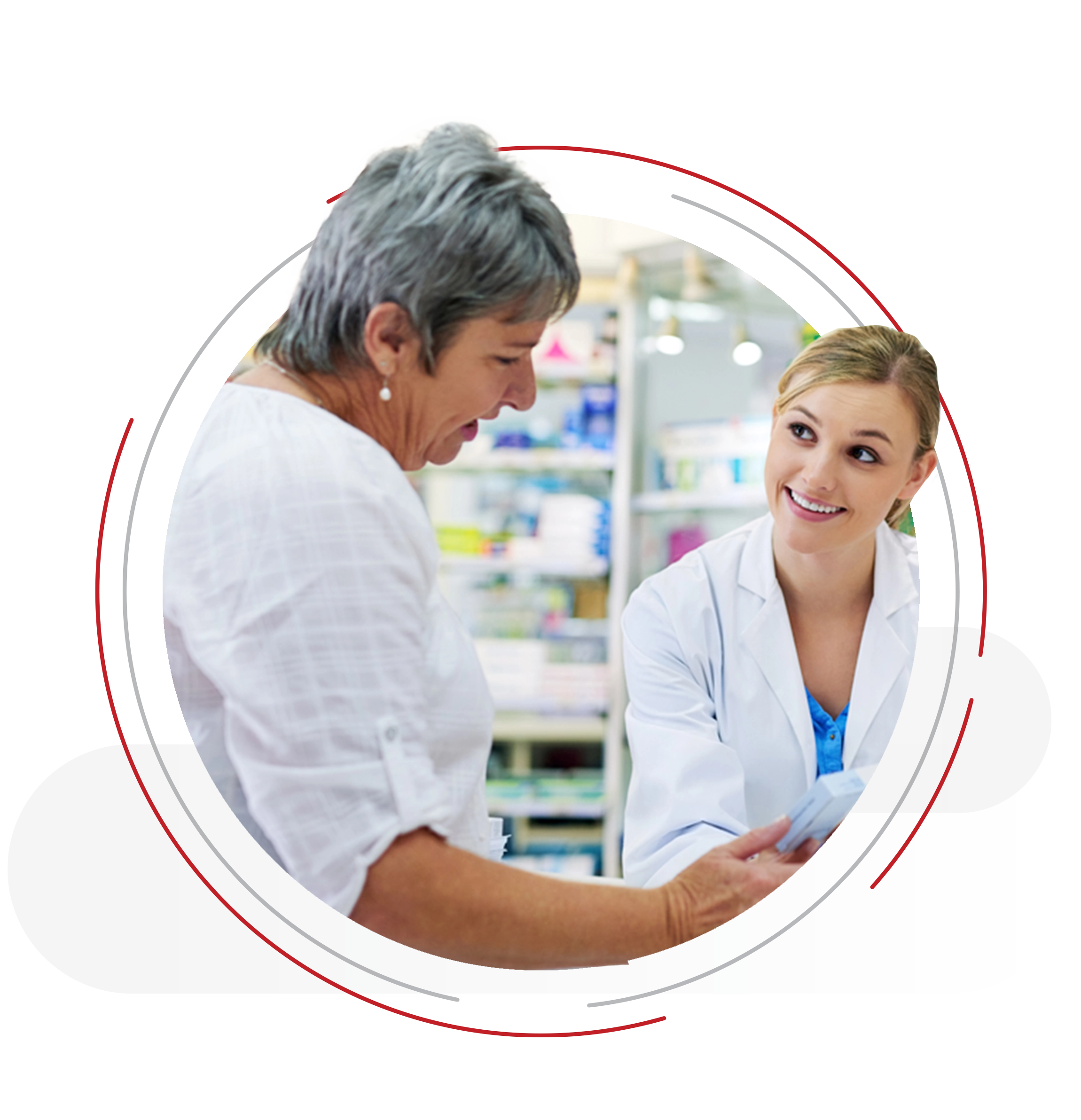 Female pharmacist in white coat scanning a medication box at a pharmacy counter with a computer.