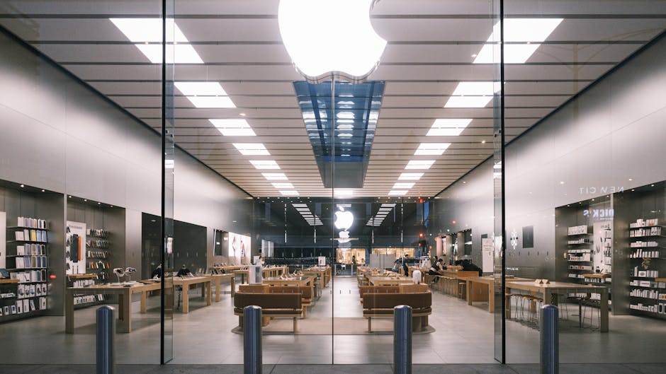 Explore the minimalist design of a modern tech store interior, showcasing a bright, elegant layout.