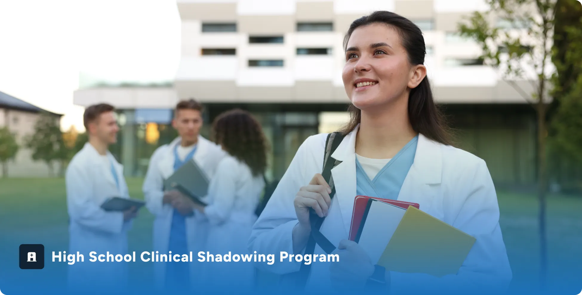 Smiling young female medical student holding folders with three other students talking in the background outside a modern building.