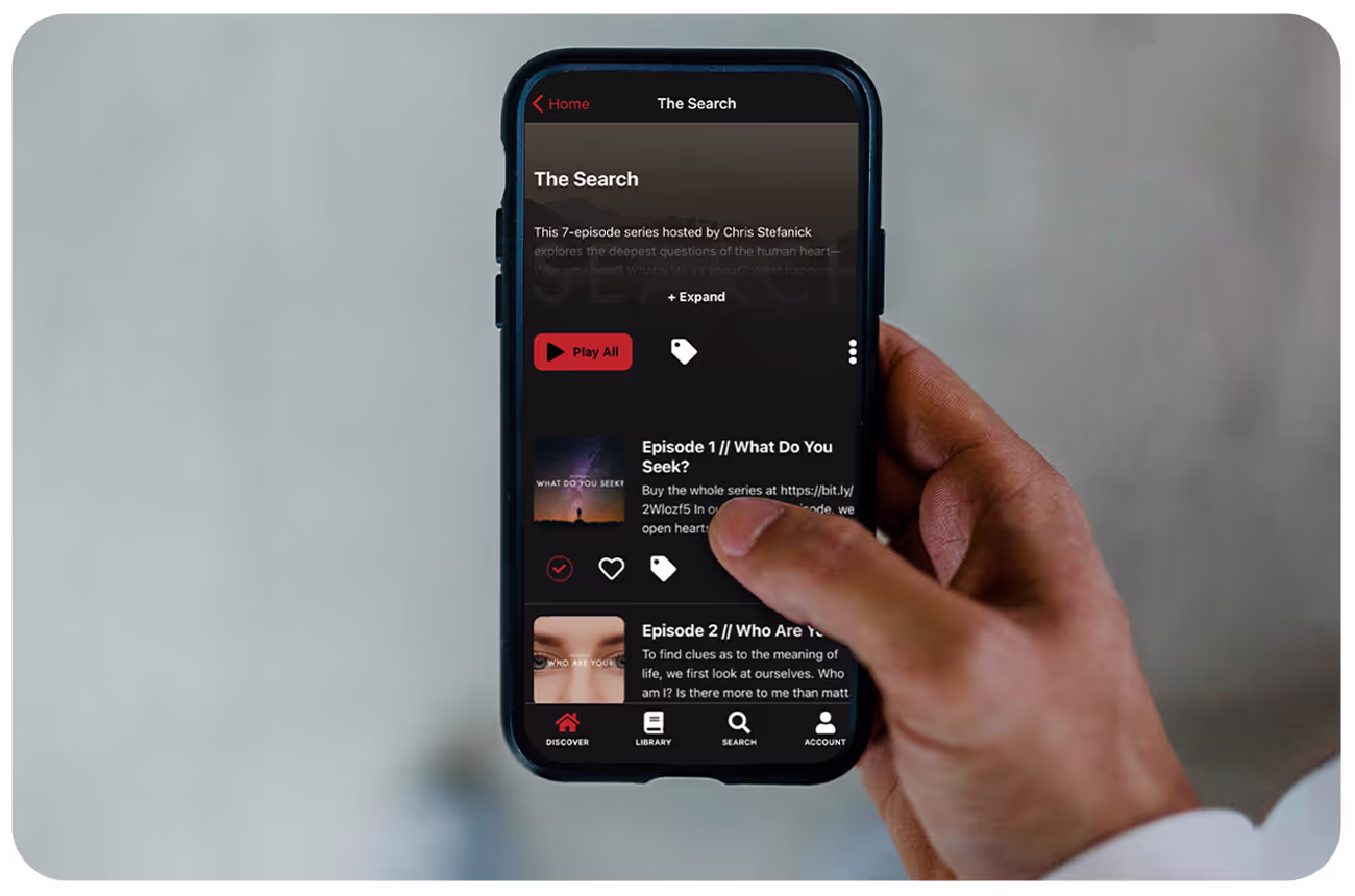 Man using cellphone with OTT app