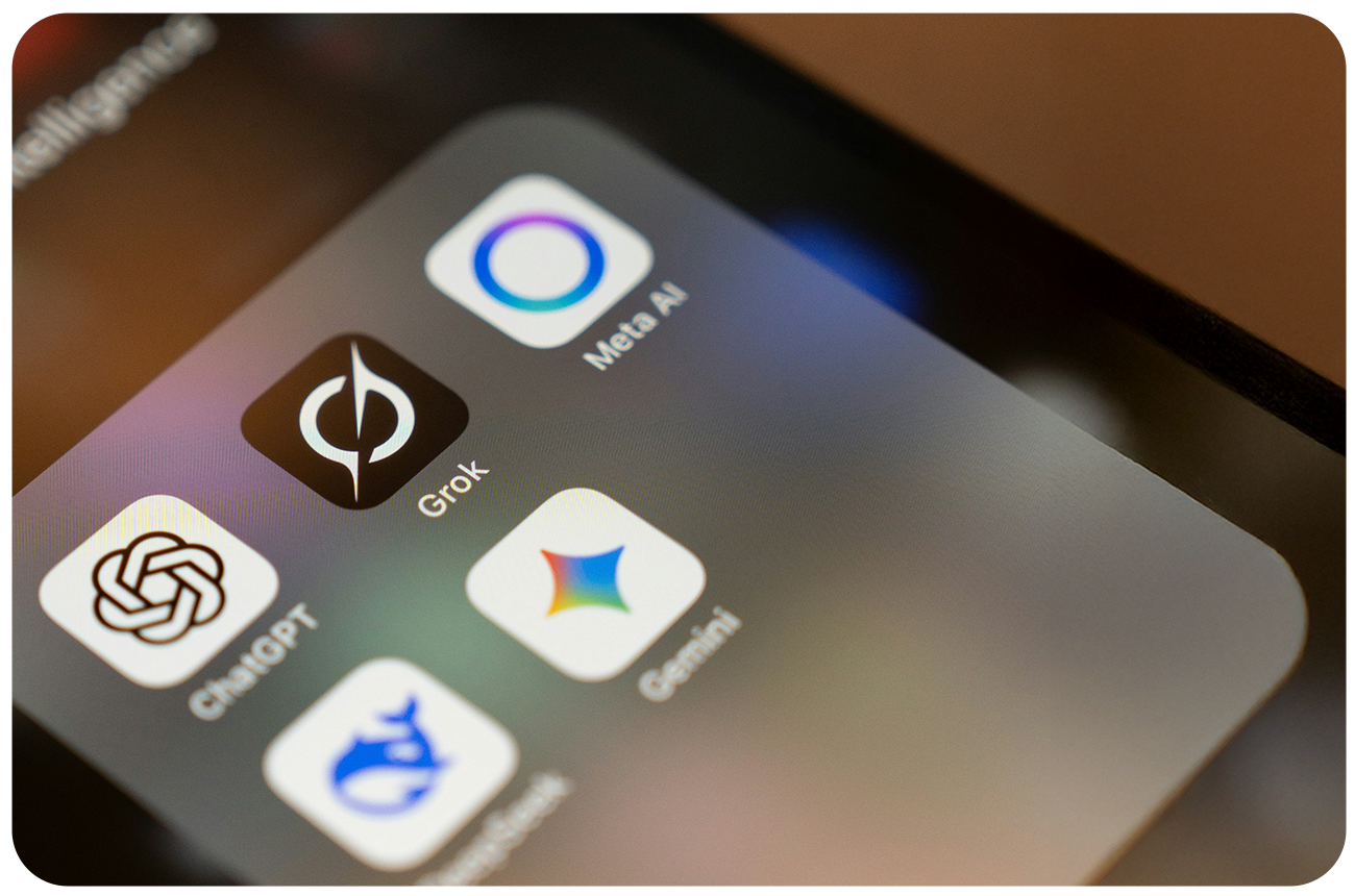AI apps ChatGPT, Grok, MetaAI, Deepseek, and Gemini on an iPhone screen
