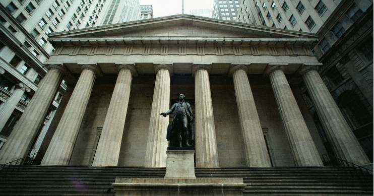 The exterior of a bank with classical architecture