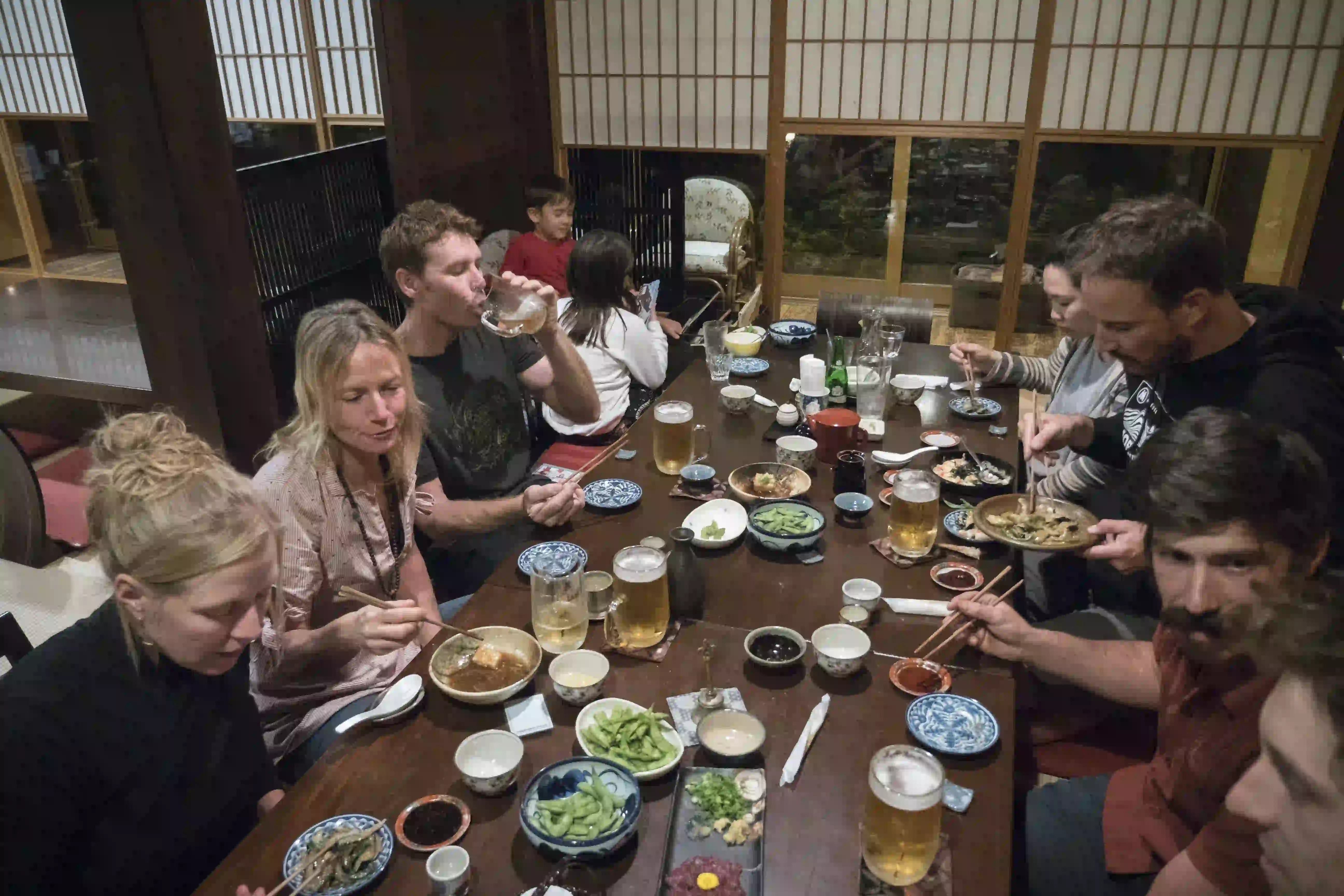 Western eating a traditional Japanese meal