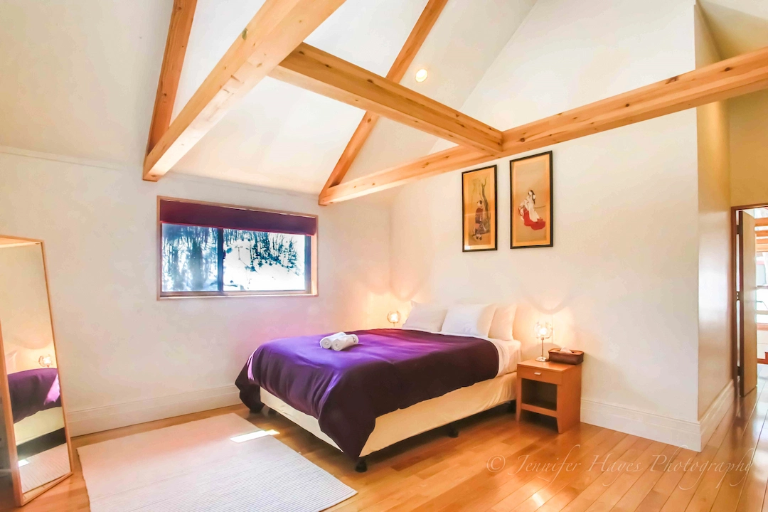 Spacious bedroom in the modern chalet