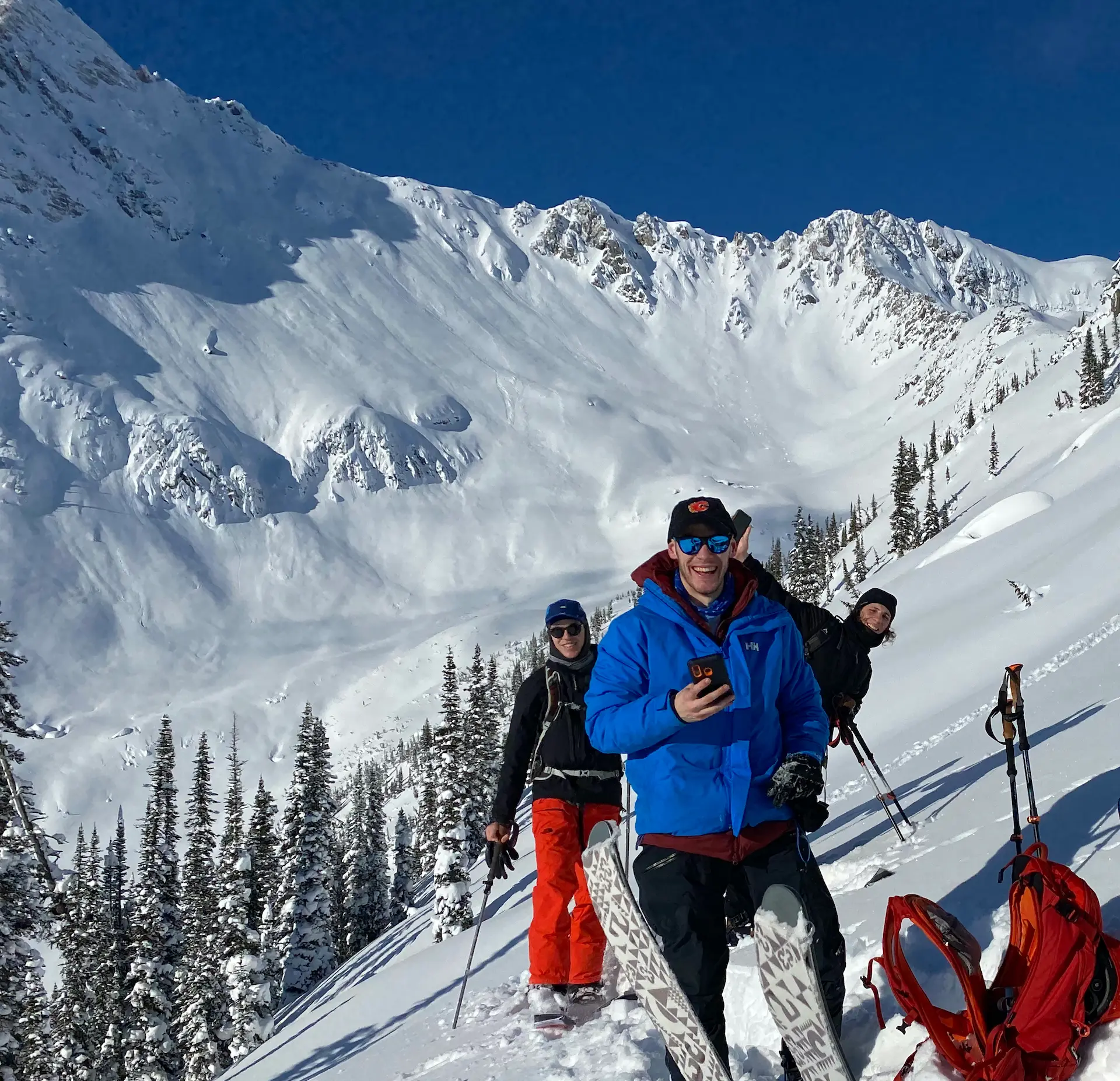 Ski tourers enjoying a snack break, Rogers Pass