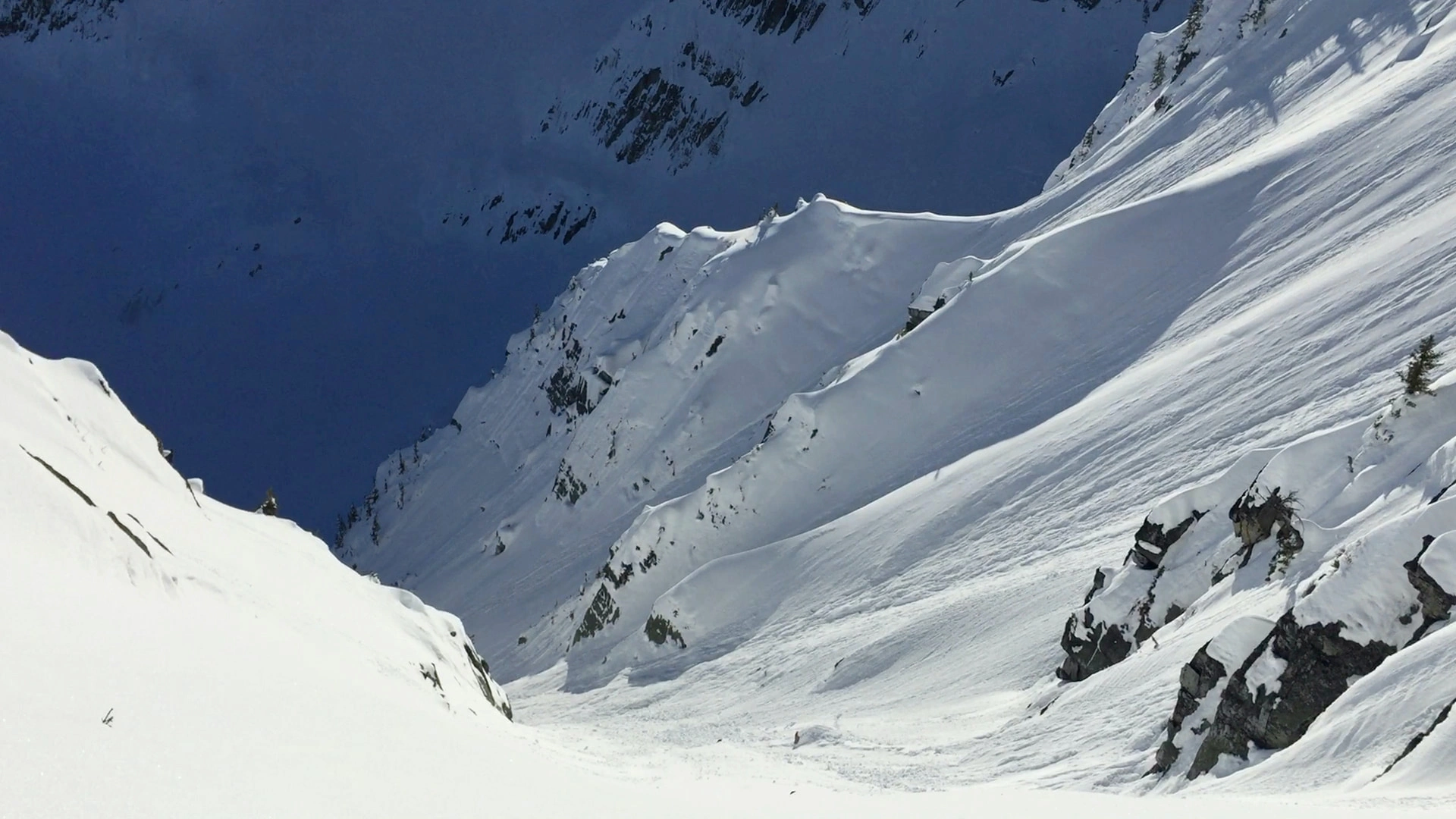 Looking down a steep fluted decent, Rogers Pass