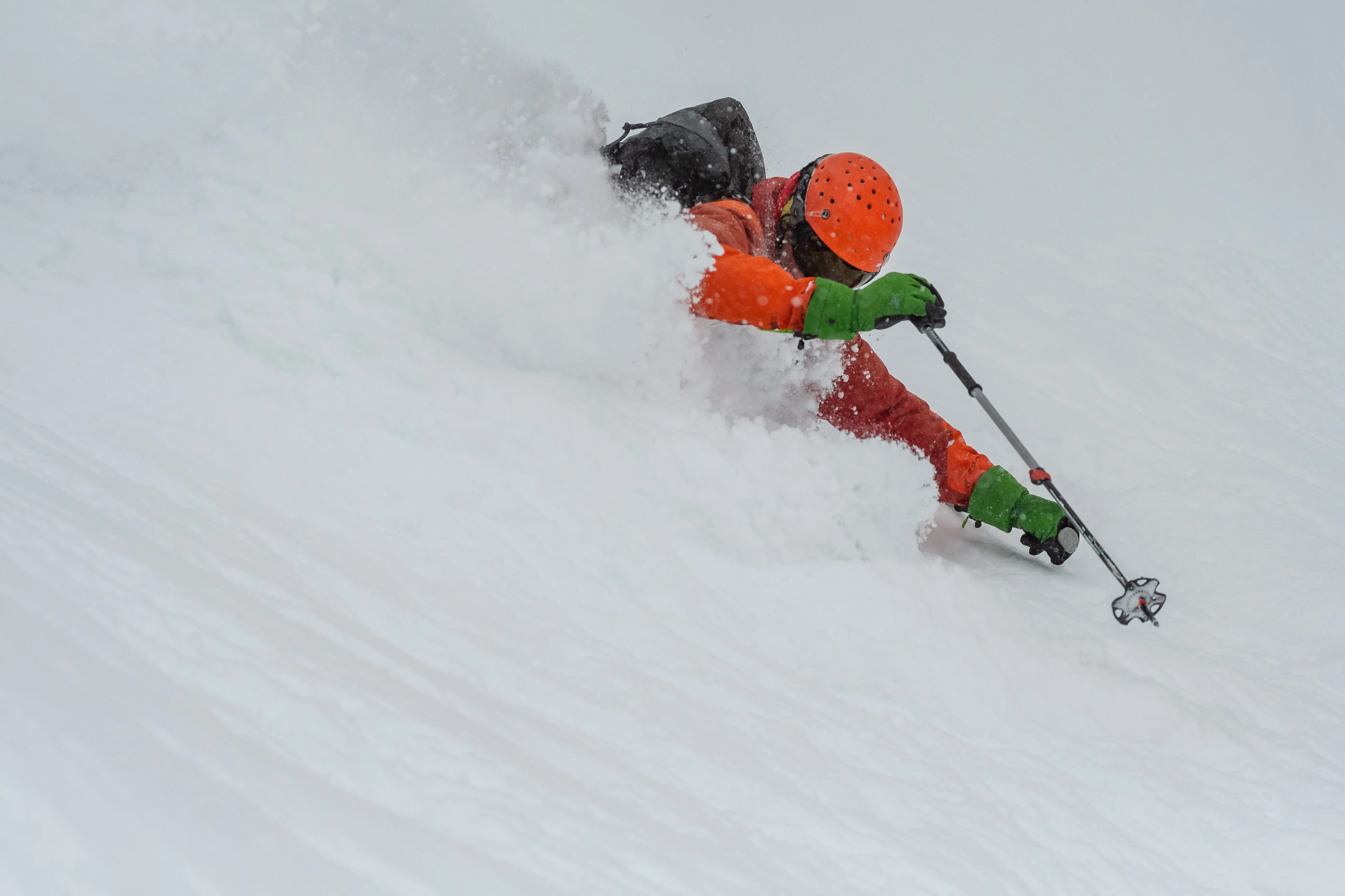 Will, skier getting deep up to the neck in Japanese powder