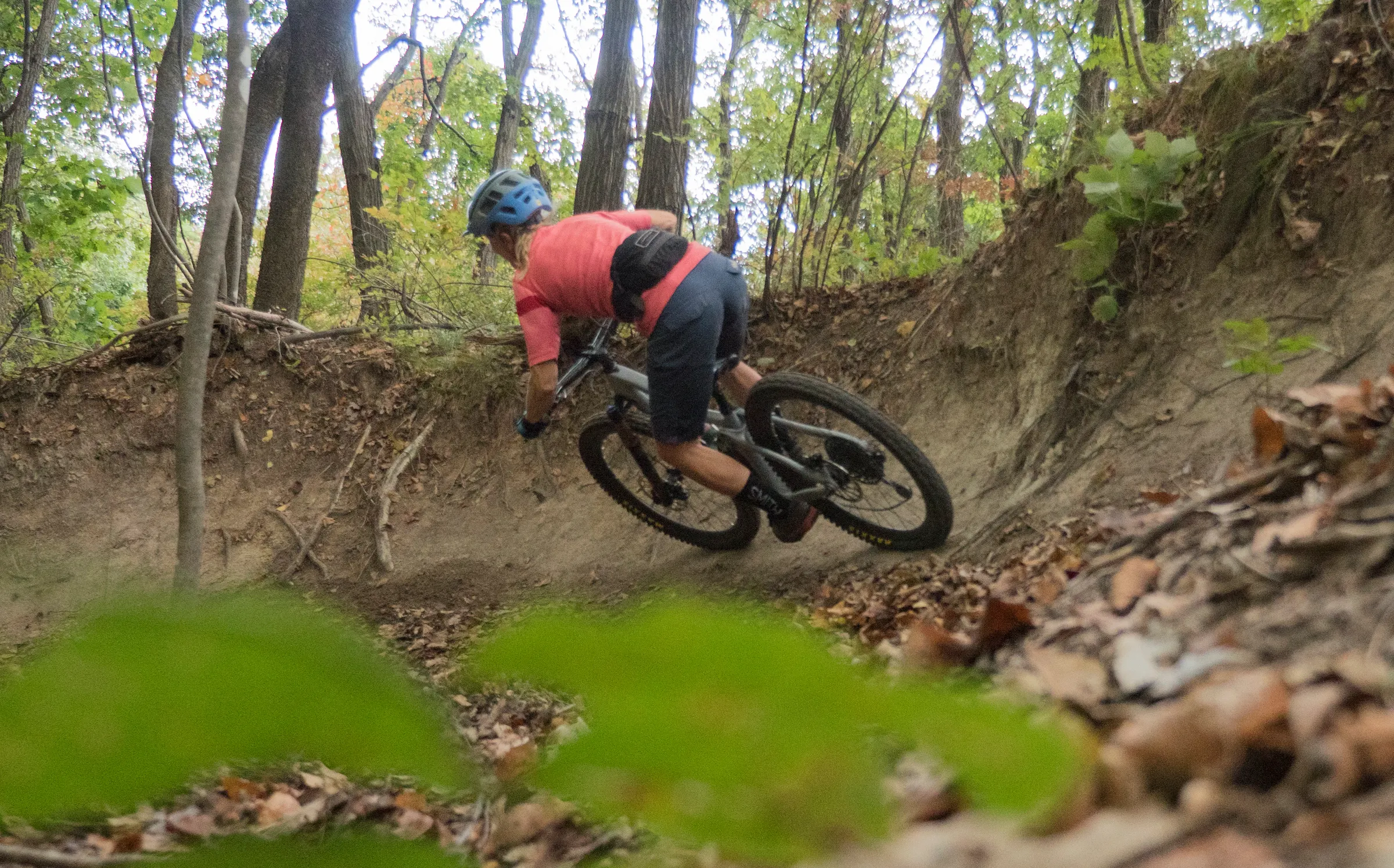 Mtn Bike rider in sandy loam on a natural berm, in the Japanese Alps.
