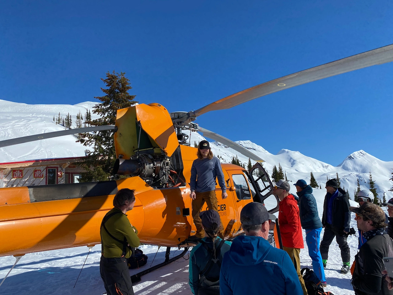 A pilot opens the flaps to reveal the Jet engine that powers the Astar Helicopter