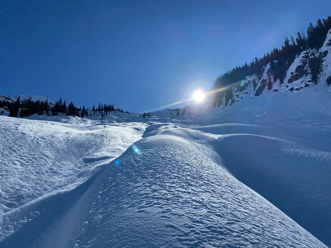 Looking up a playful ski run 