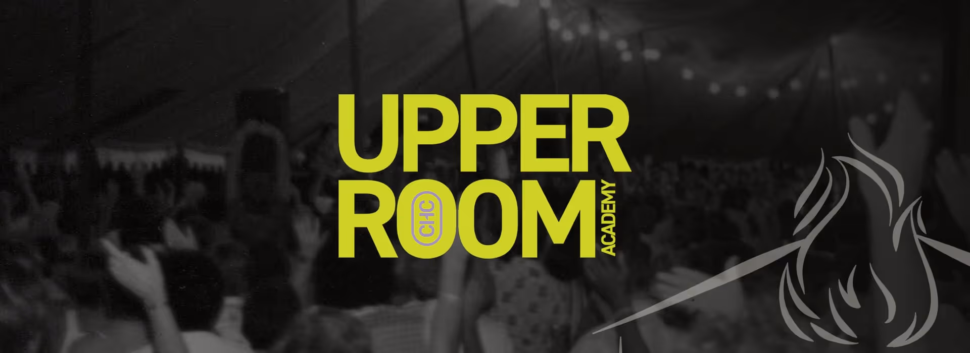 Logo for Upper Room Academy with crowd and stage lights in a dark event setting.