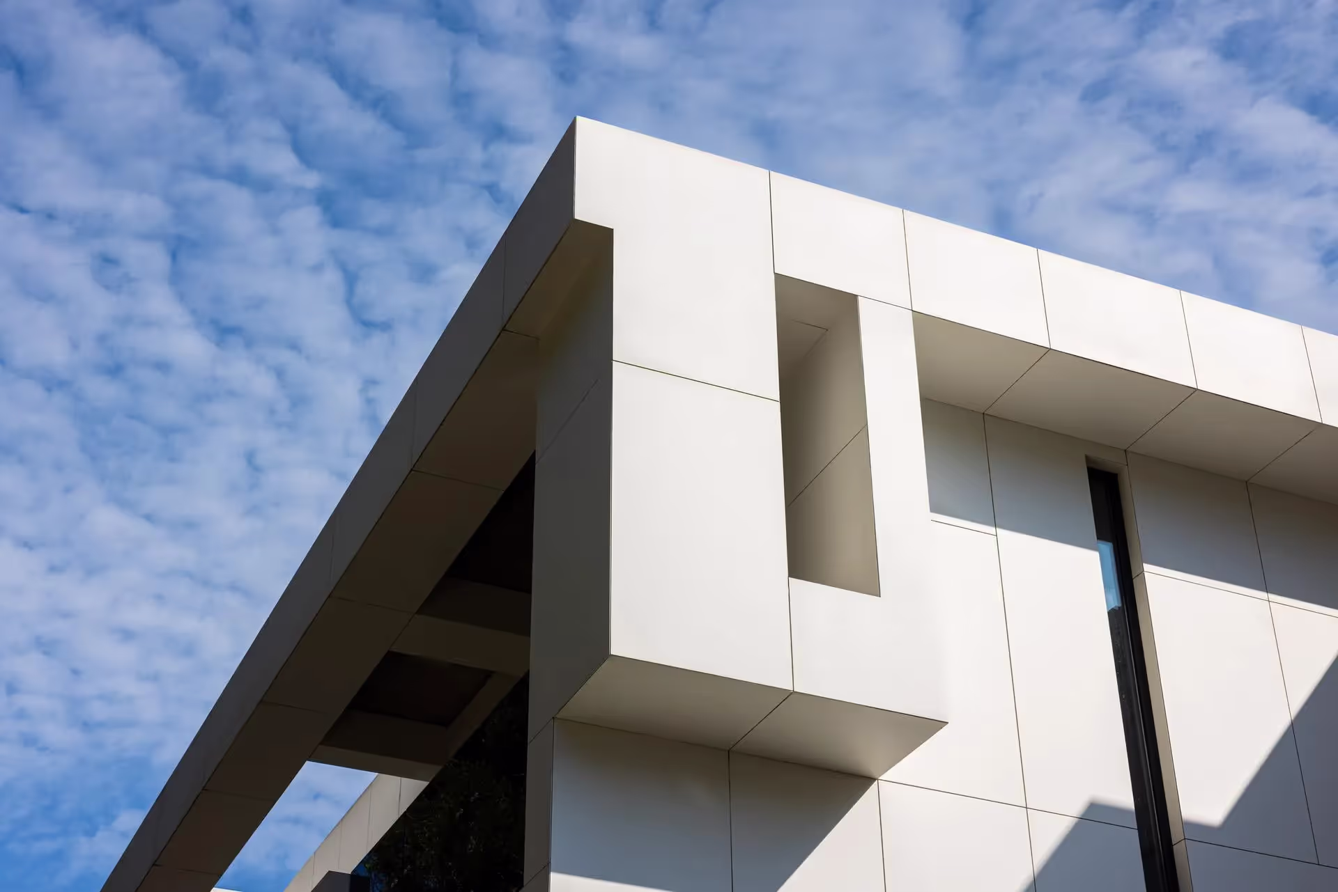 Exterior sintered stone cladding on a commercial building
