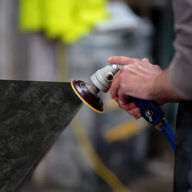 Stone mason wet polishing Neolith Layla worktop