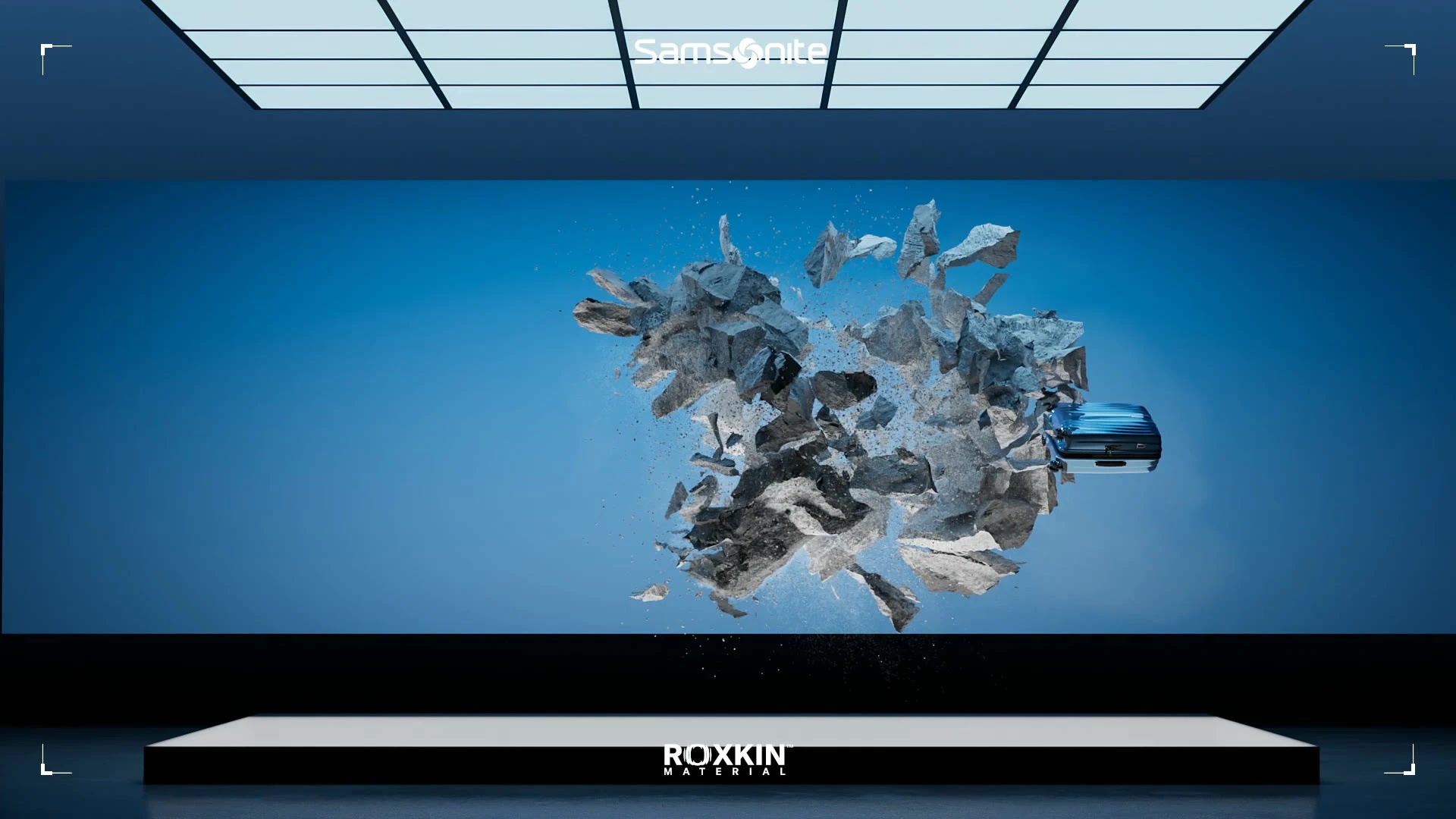 Samsonite – Nexis – suitcase bursting through rock, CGI cover