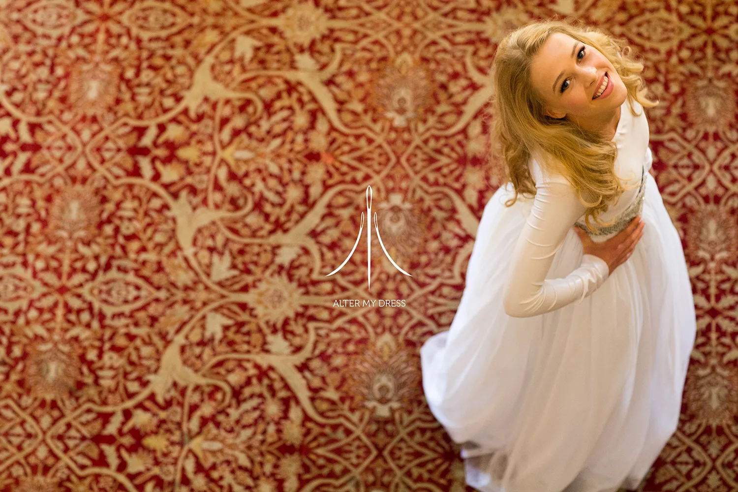 Alter My Dress logo on overhead image of a bride in her wedding dress 