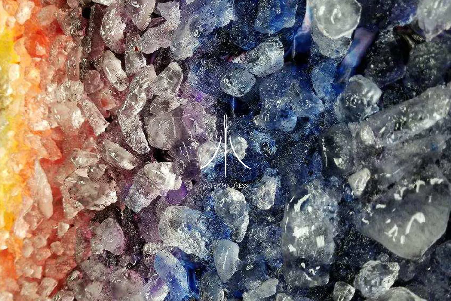 Cooling rack with ice chunks covered in a gradient of yellow to brown powder and plastic wrap on the right side.