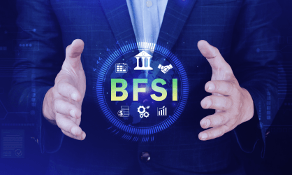 Businessman in suit holding a glowing digital interface with BFSI and finance icons.
