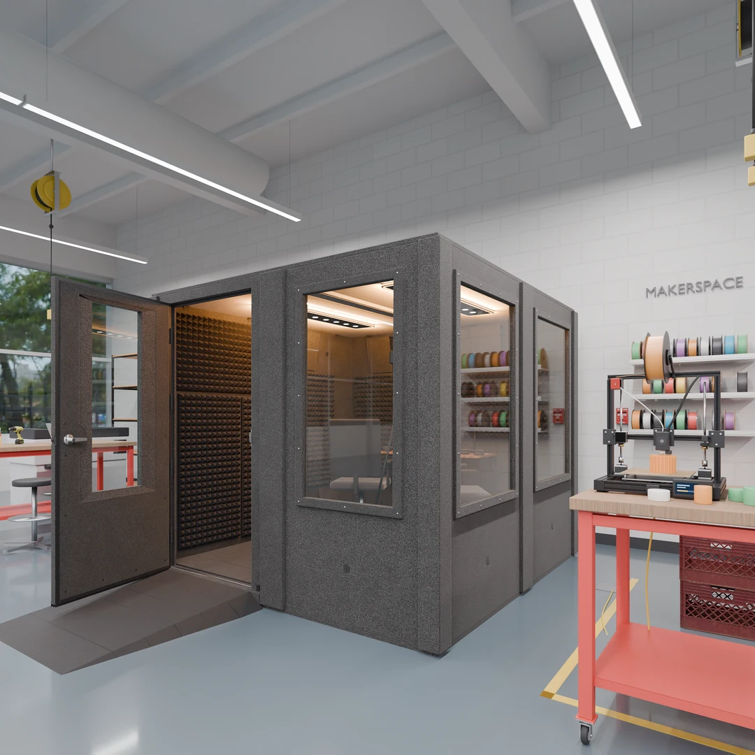 Makerspace Booth open in a school makerspace next to a 3D printer and filament spool shelves, ramp at the 32" door