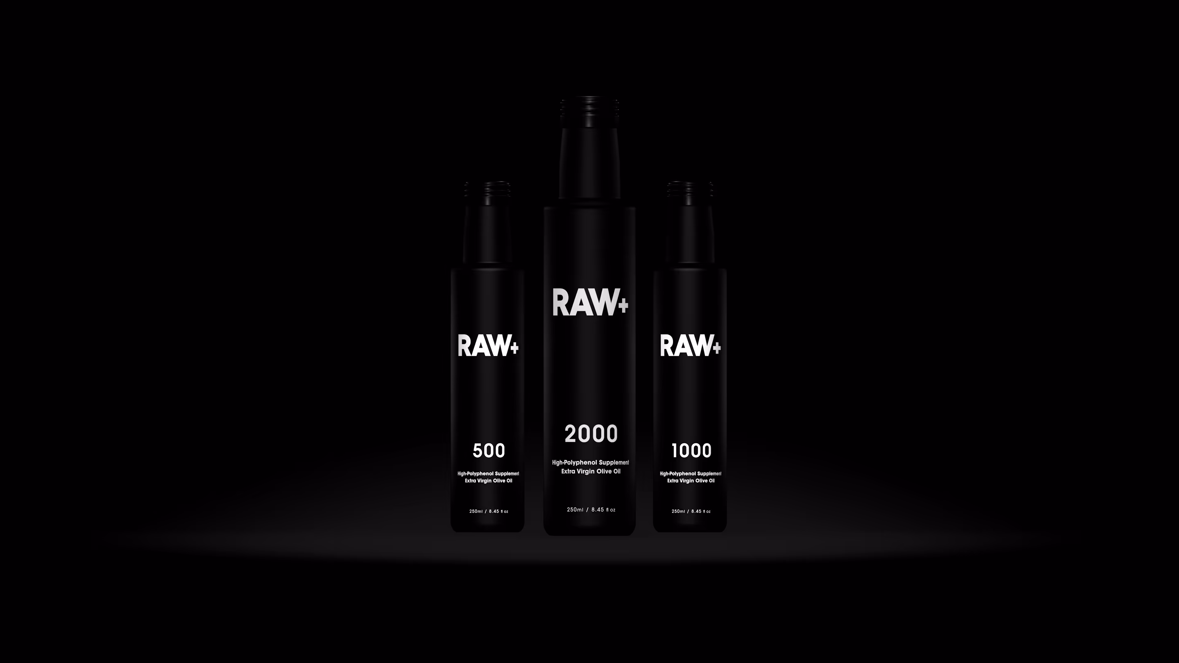 Three black bottles of RAW+ extra virgin olive oil with labels showing 500, 2000, and 1000 polyphenol units.