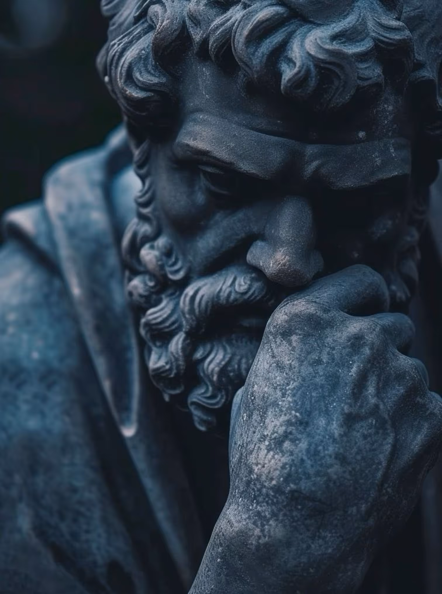 Statue depicting thinking philosopher.