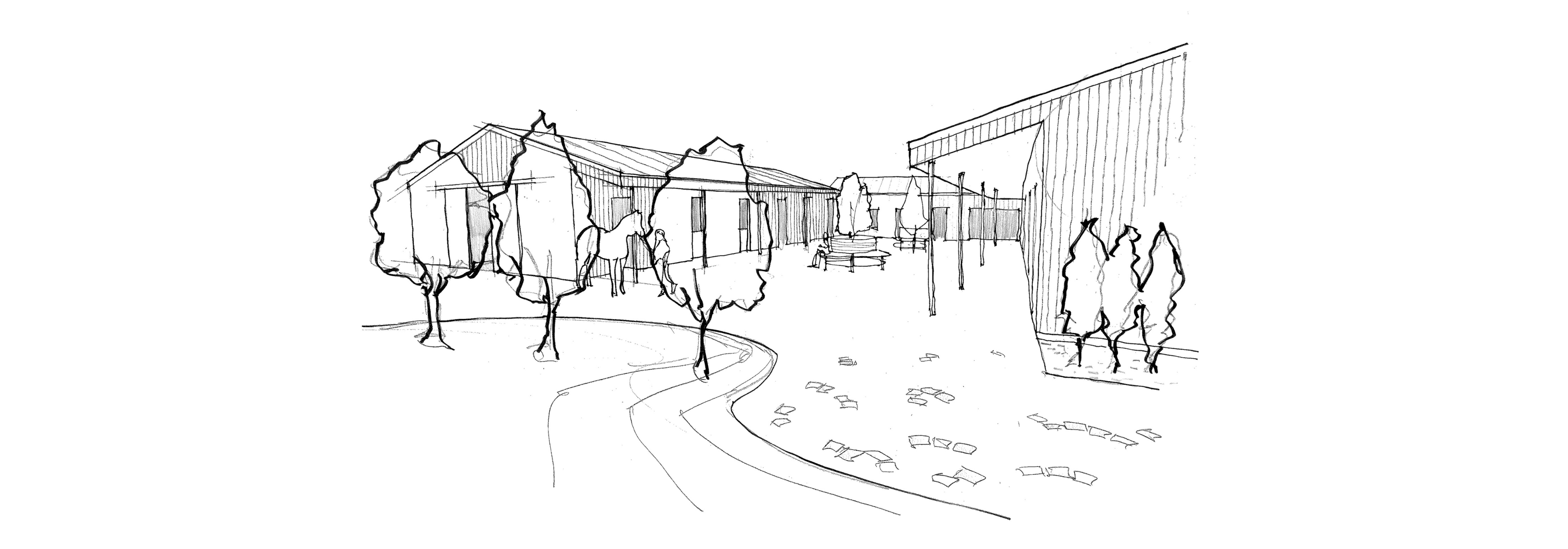 A well-designed equestrian stable courtyard featuring timber-clad stalls, durable brick paving, and sheltered walkways.