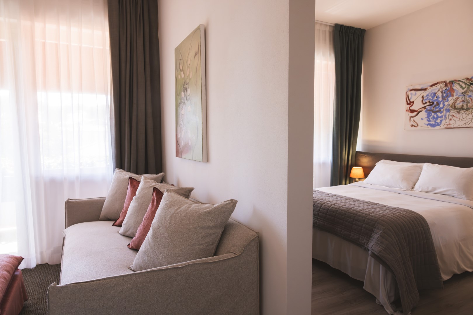Room featuring soft lighting and luxurious bedding for ultimate comfort.