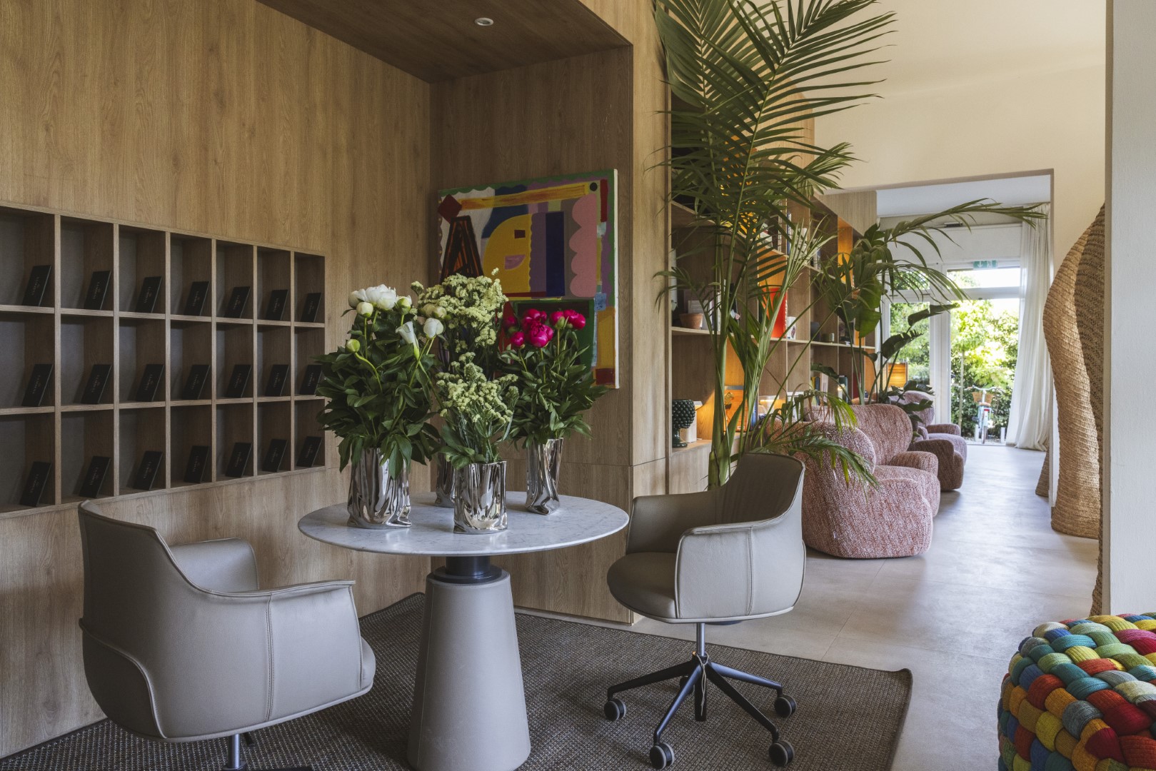 Elegant library space with a curated selection of books and comfortable seating.