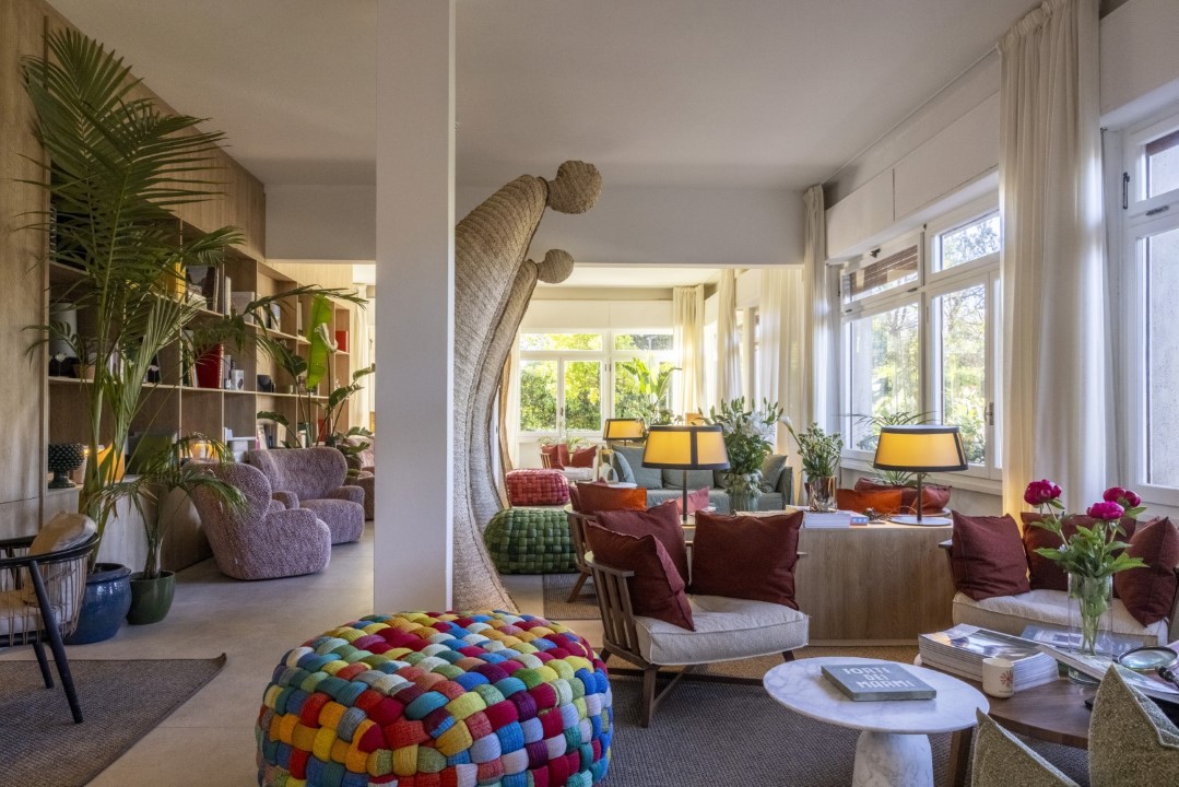 Elegant library space with a curated selection of books and comfortable seating.