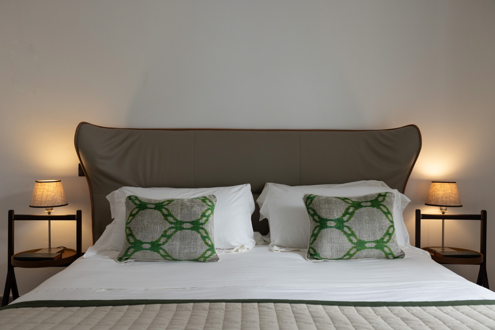Luxury suite featuring a private terrace overlooking beautifully landscaped gardens.