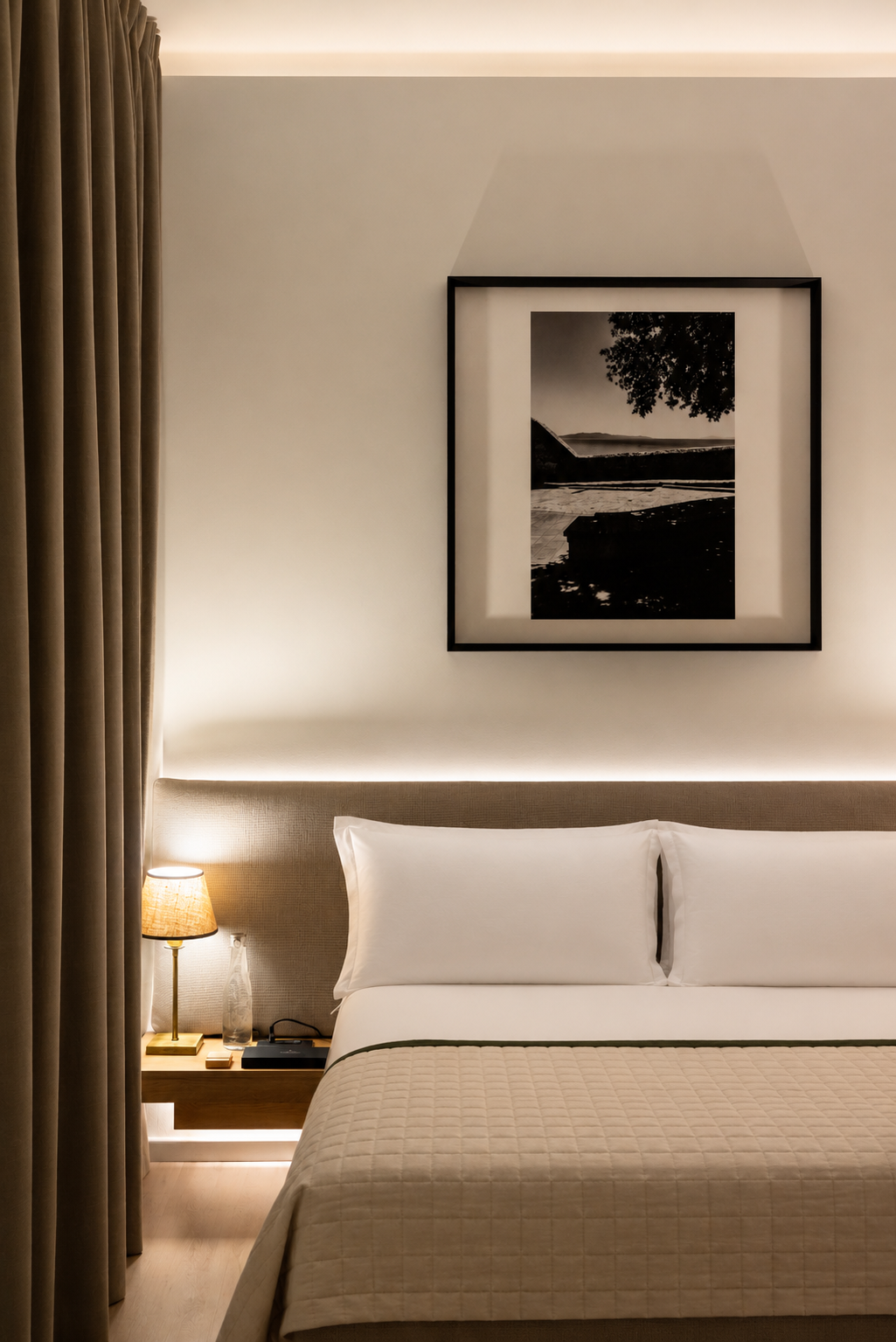 Stylish superior room with a king-sized bed, modern furnishings, and warm lighting.